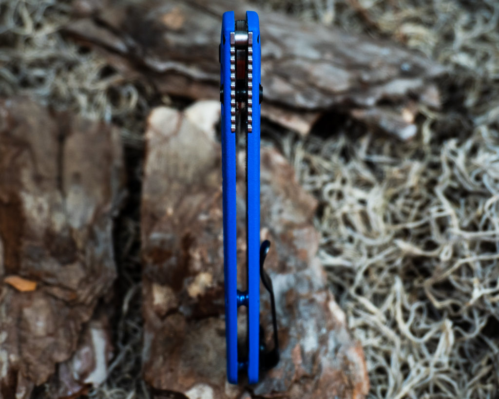 Benchmade Bugout in Blue Spine of Handle Shot
