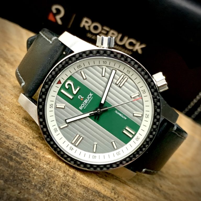 Roebuck Watch Co Division Green on Table